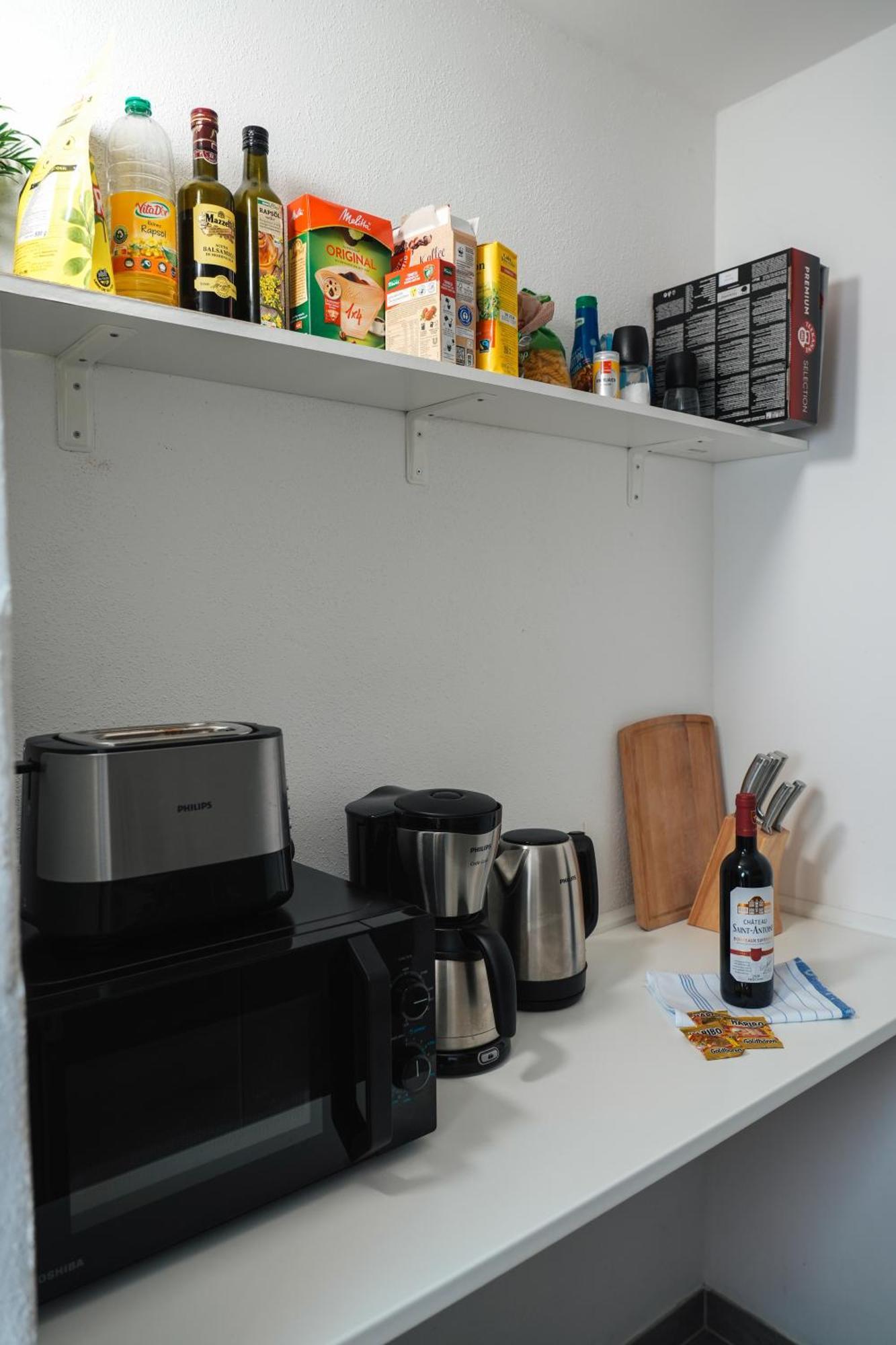 Global Living - Design I I Beamer I Kitchen I Terrace I Lejlighed *