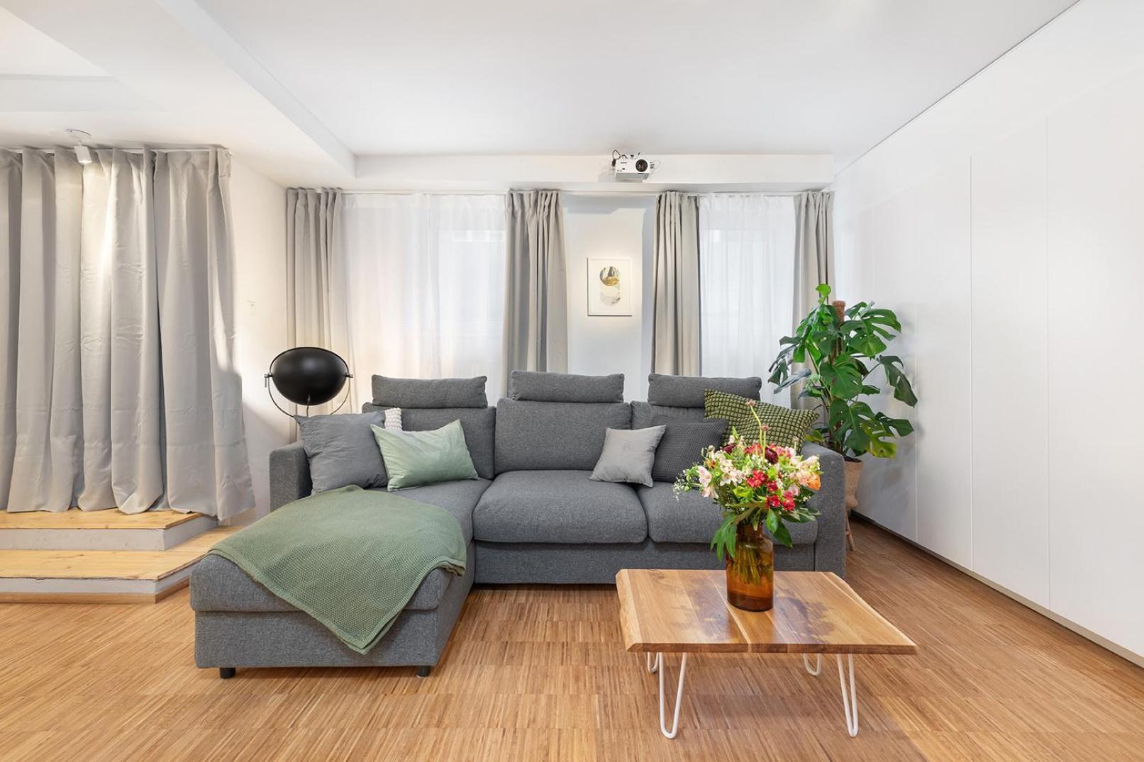 Stylish With Cinema, 2-min Tram Apartment