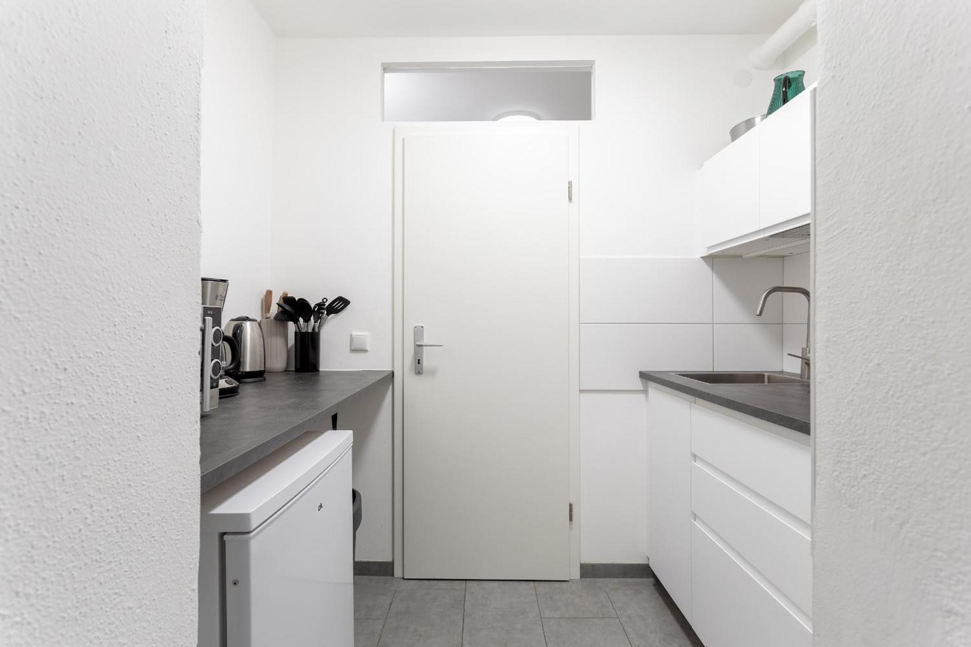 Global Living - Design I I Beamer I Kitchen I Terrace I Lejlighed *