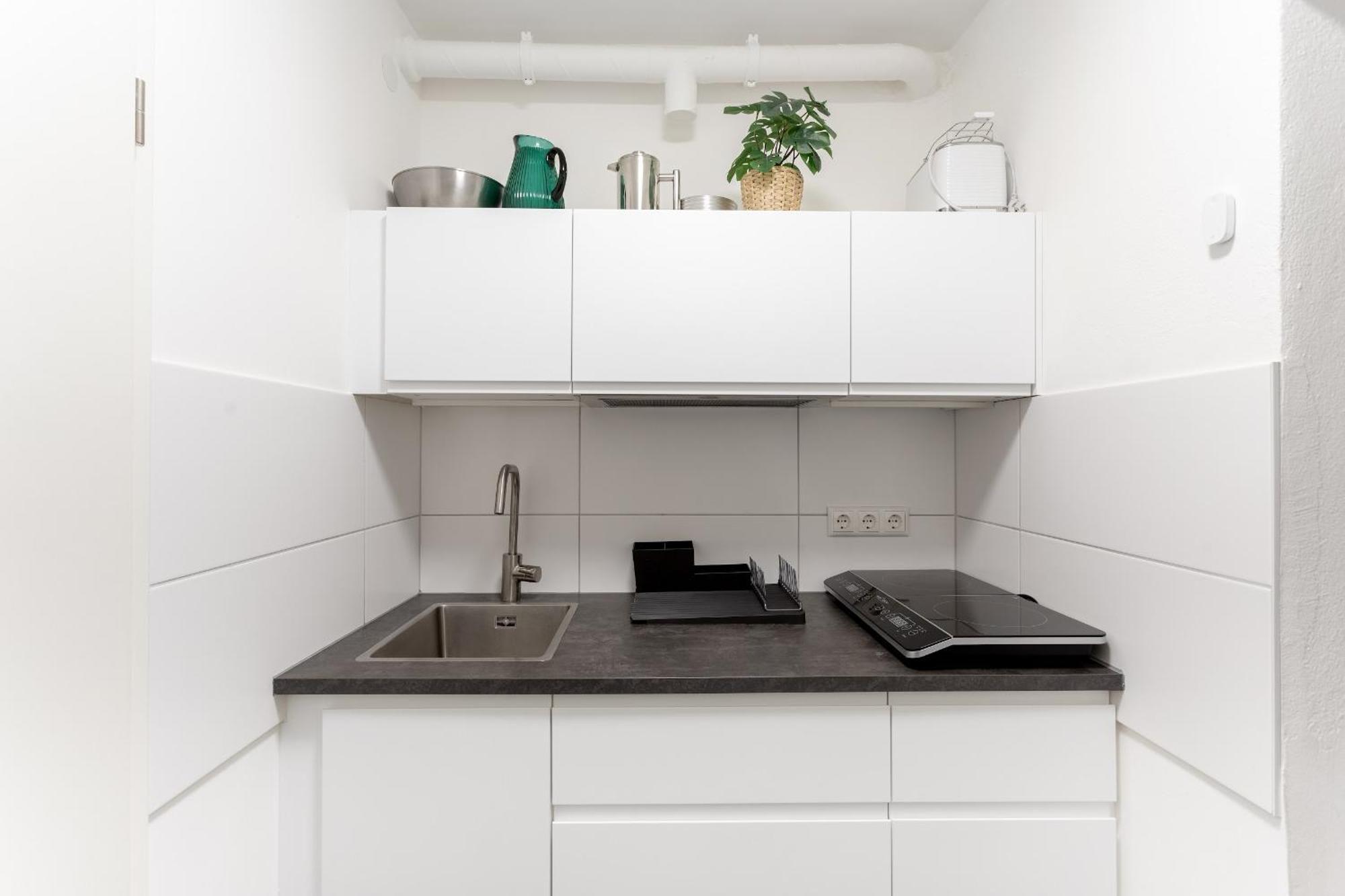 Global Living - Design I I Beamer I Kitchen I Terrace I Lejlighed Berlin
